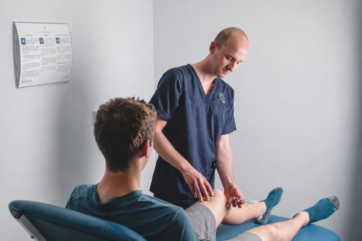 Image shows the Amicus team treating a patient